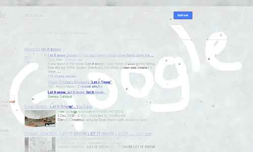 Let it Snow Google Trick recreation with falling snowflakes, screen frost effect, and defrost button interaction.